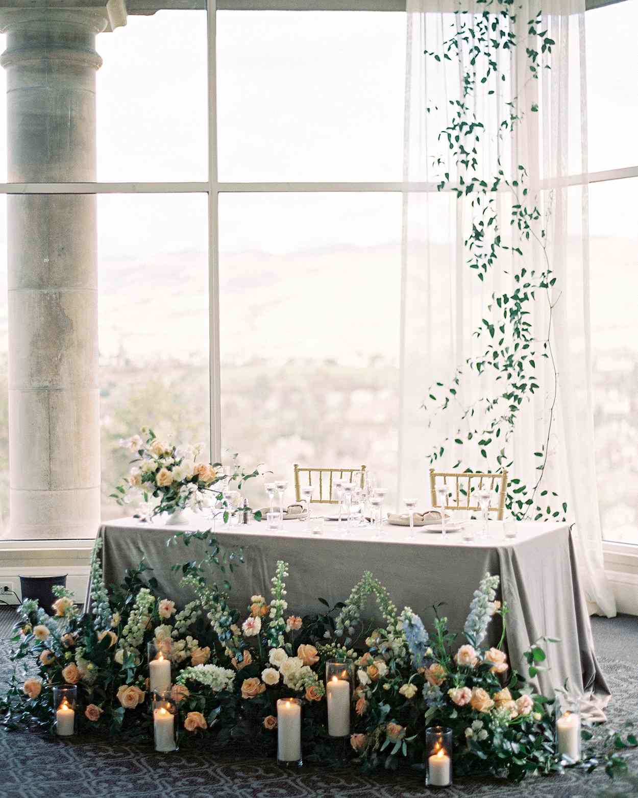 sweetheart table with tulle window backdrop