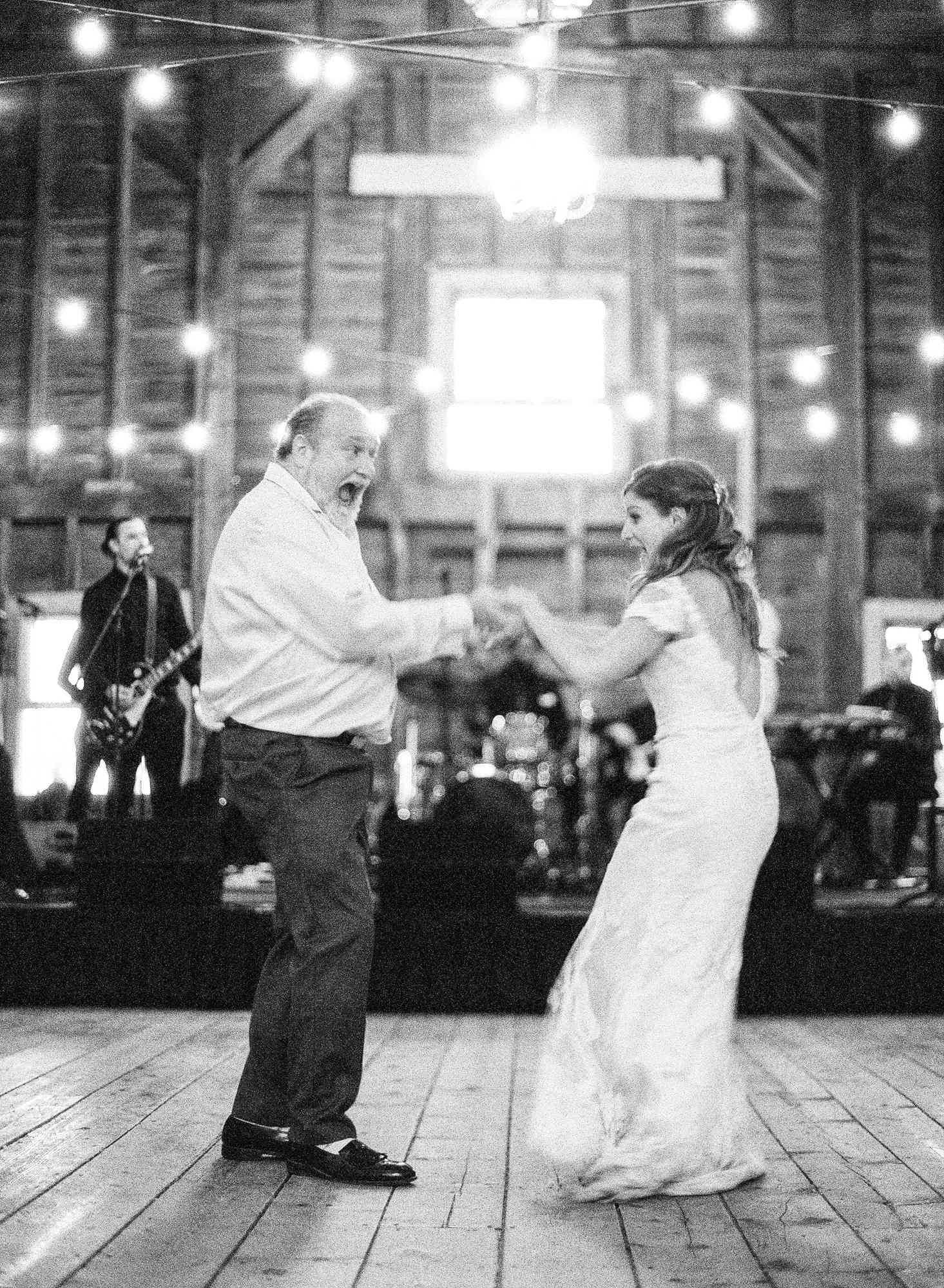 bride and father dancing at reception