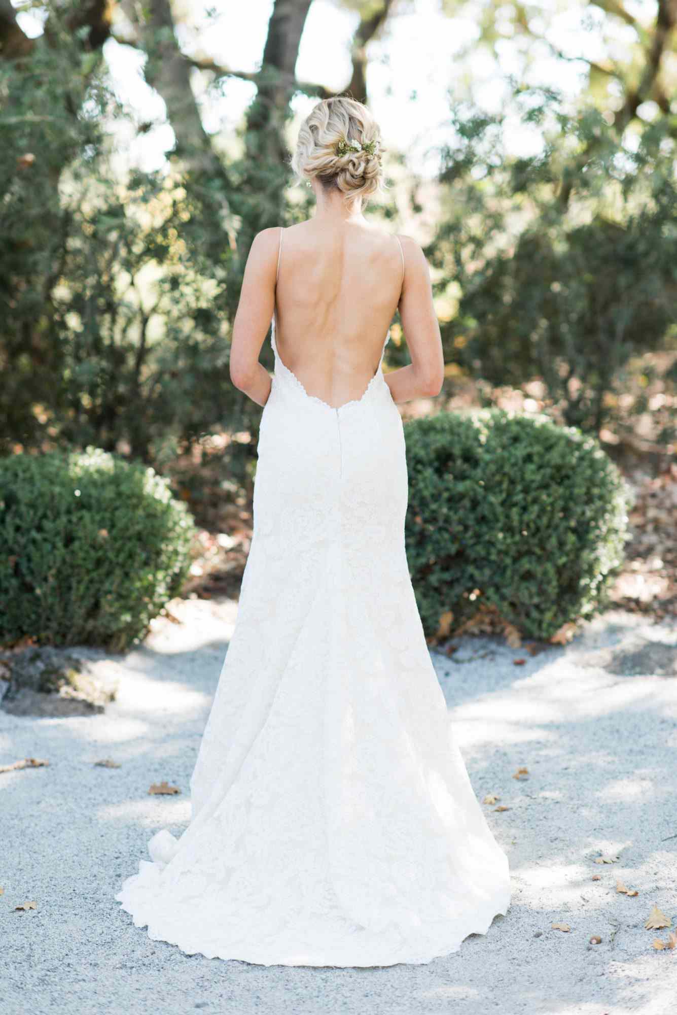A Bride Wearing an Open-Back Wedding Dress