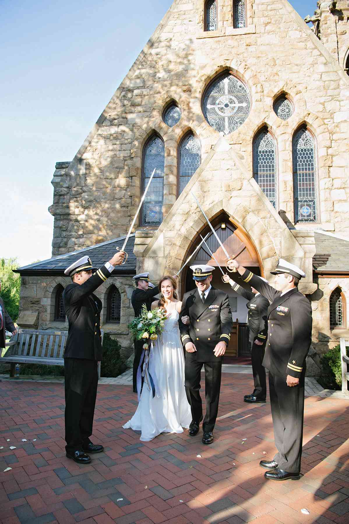 anne and staton wedding saber arch
