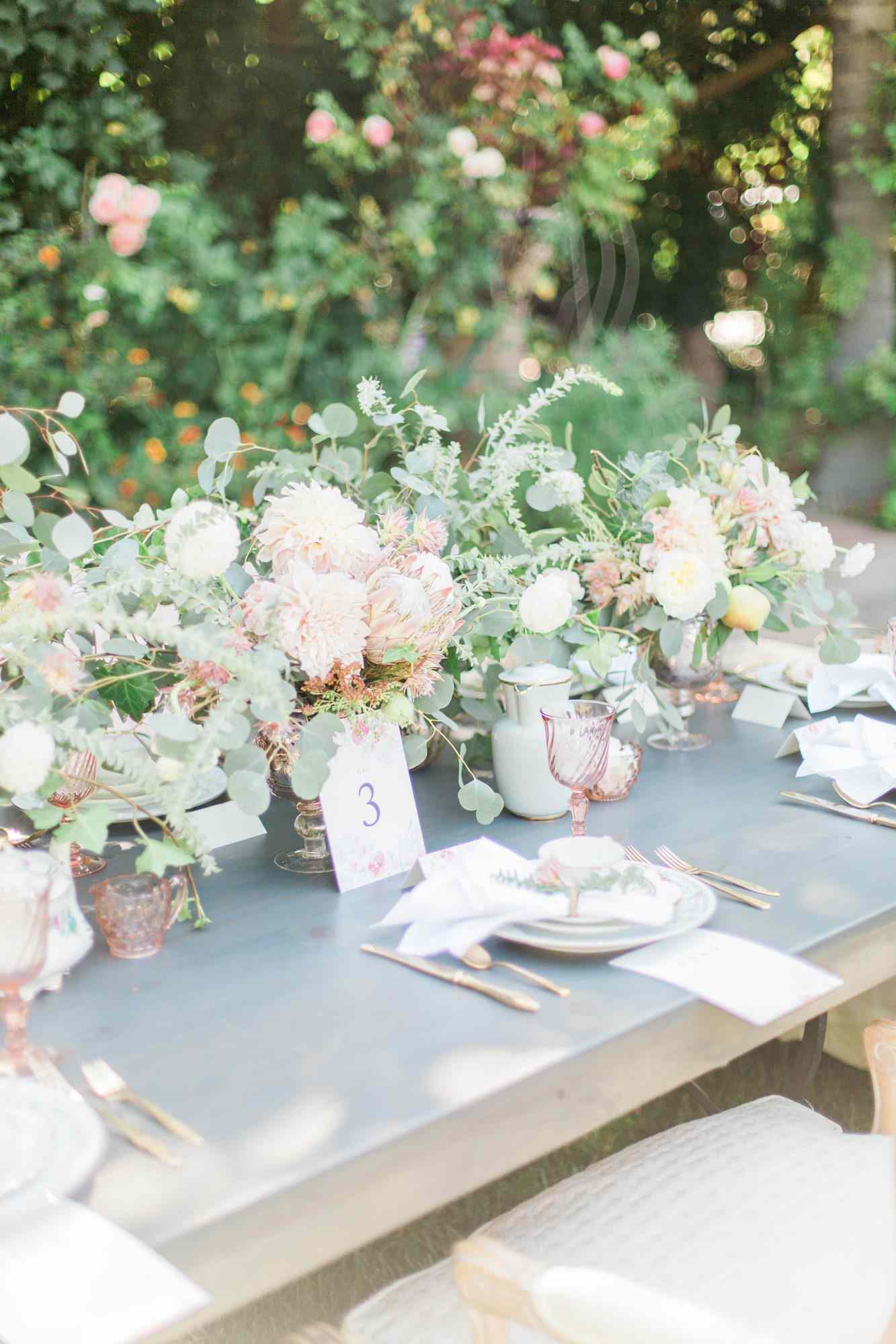 Loose, Romantic Cluster Centerpieces at Outdoor Wedding