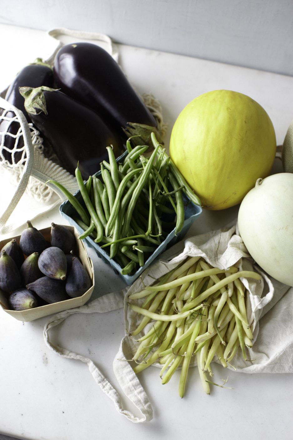 Late summer produce: eggplants, melons, figs, string beans
