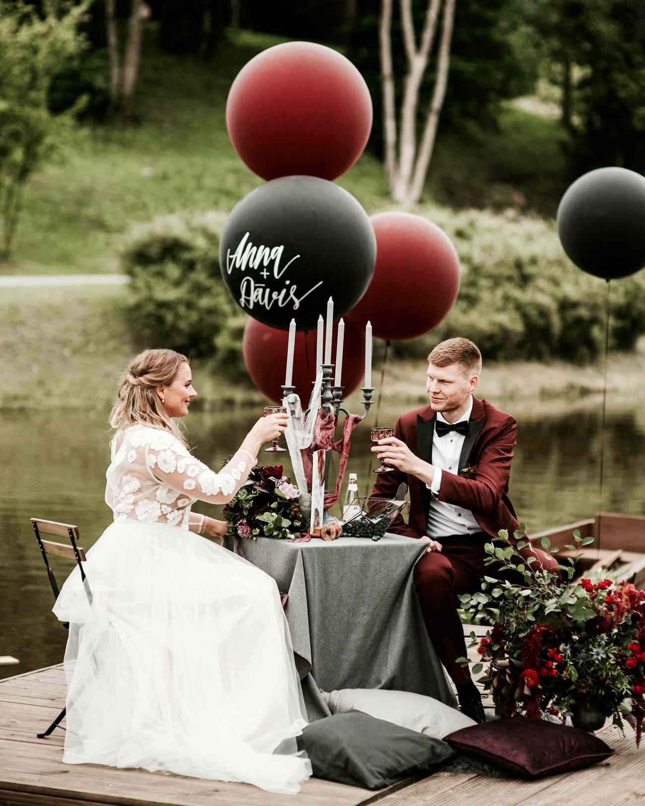dark red and black wedding balloon decor wedding color scheme