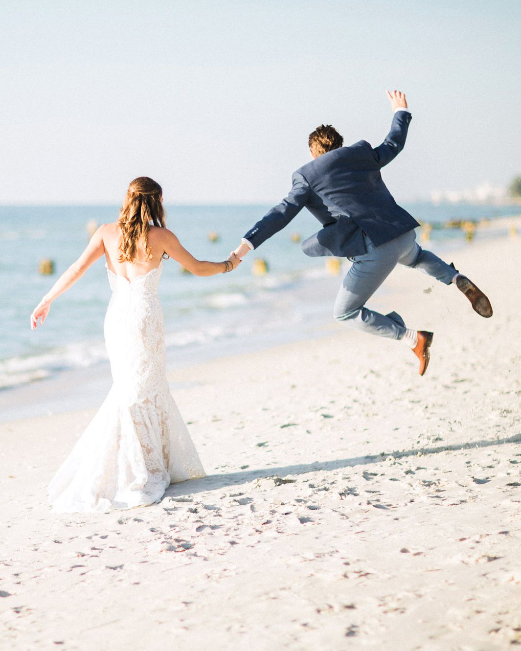 wedding couple jumping