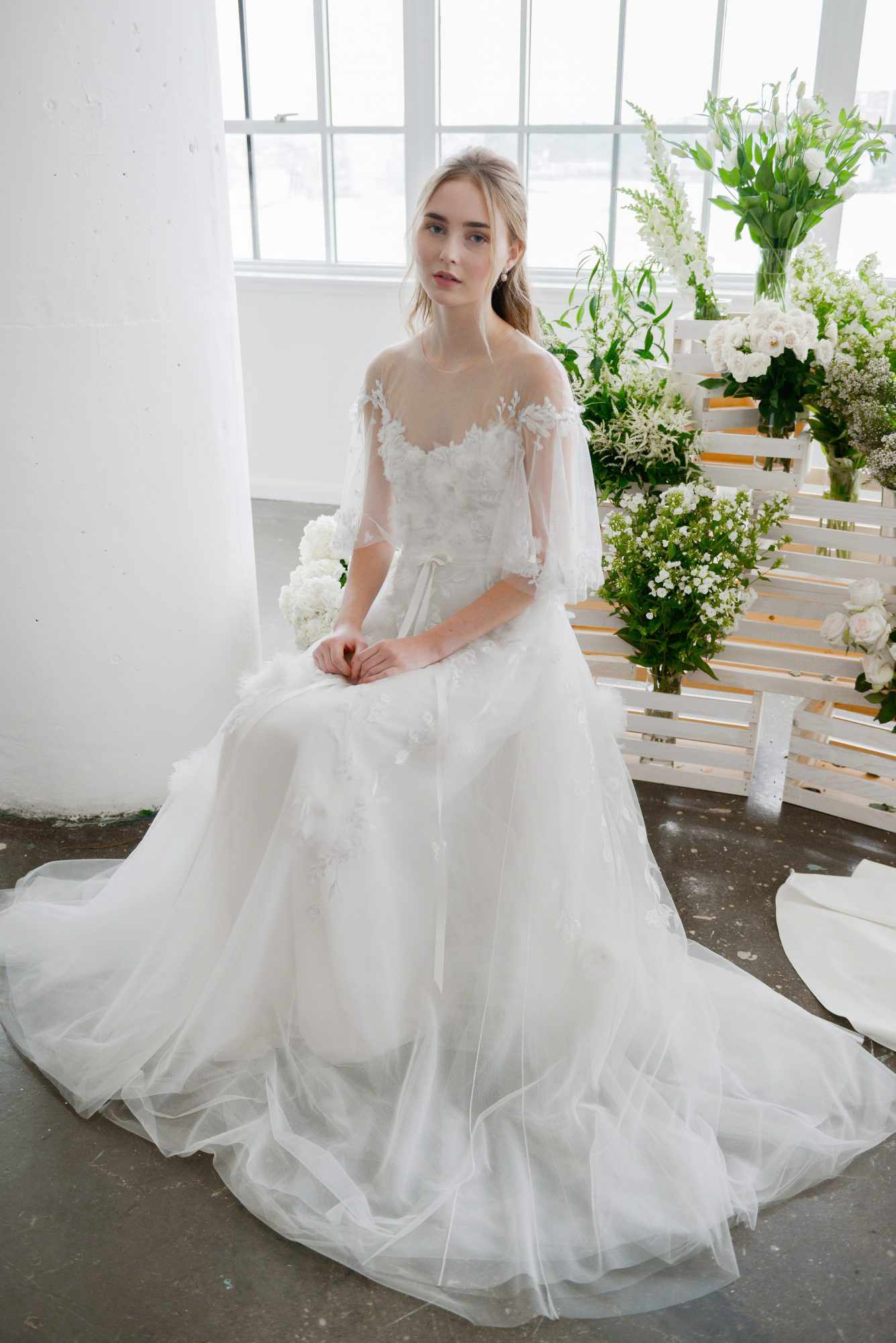marchesa notte high sheer neckline bridal wedding dress with three-quarter length sleeves fall 2018
