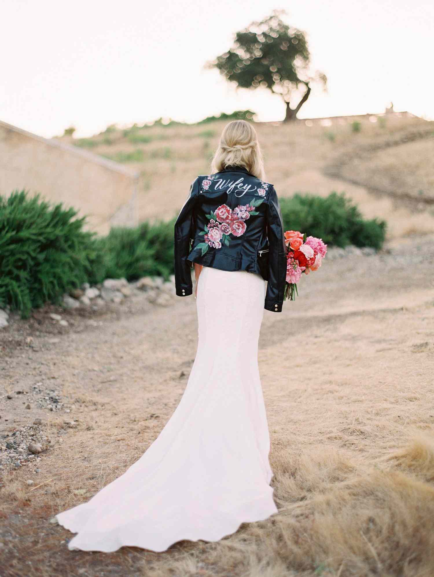 bride wearing leather jacket