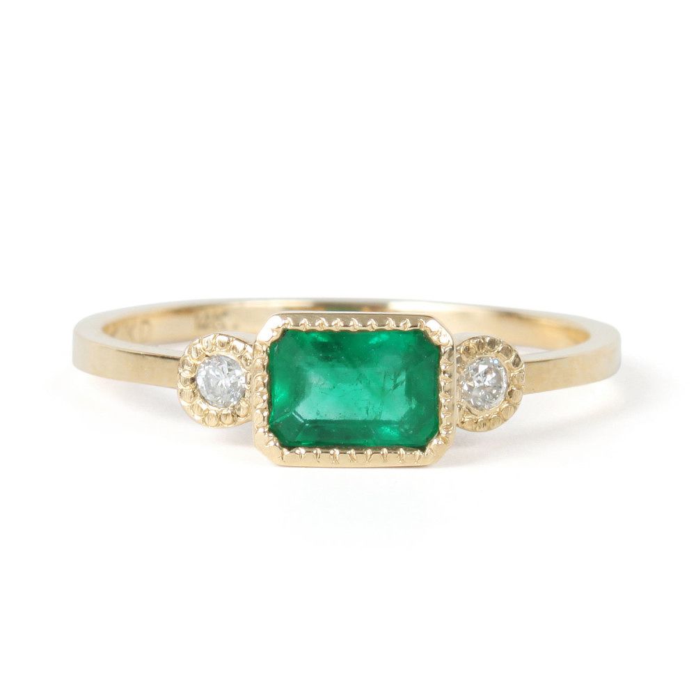 green three stone ring