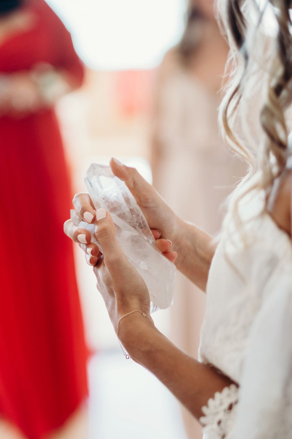 bride holding crystals on wedding day