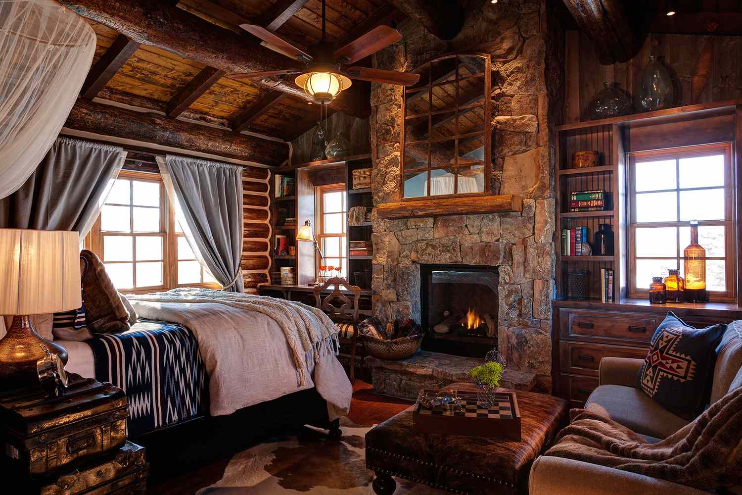 dude ranch honeymoon magee brush creek cabin interior bed fireplace