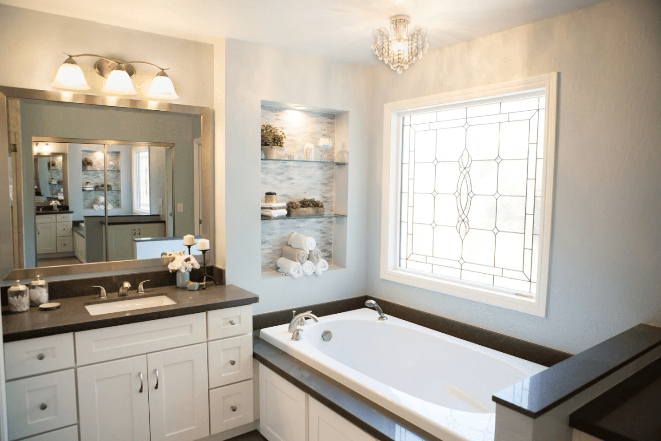 bathroom makeover with large custom window over bathtub