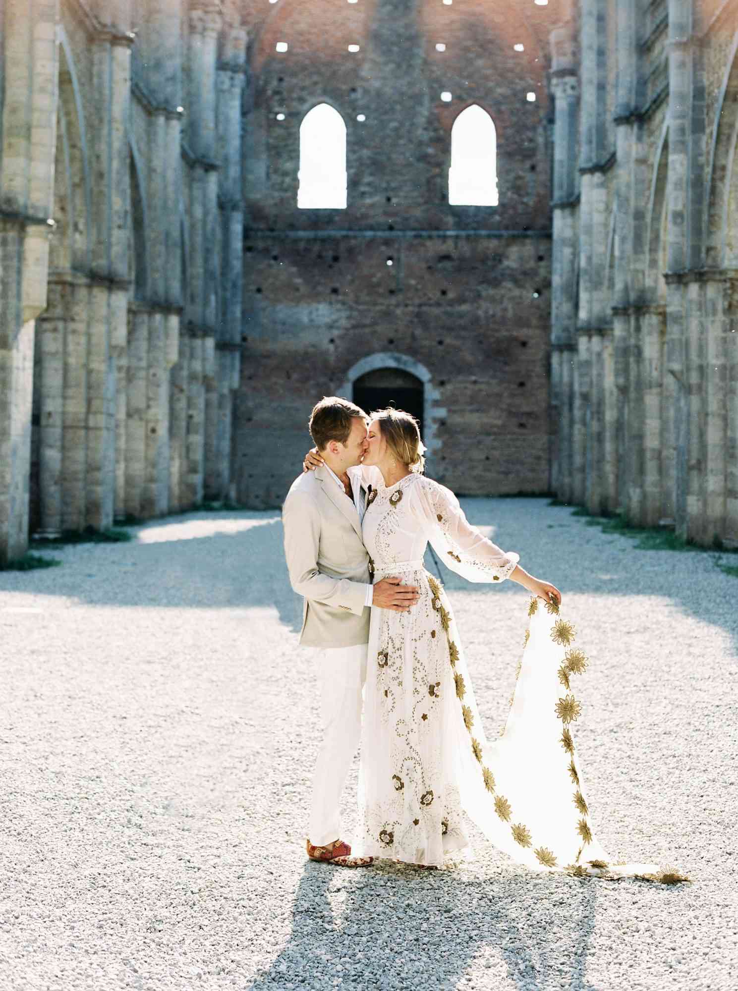alexis zach wedding italy couple kiss dress
