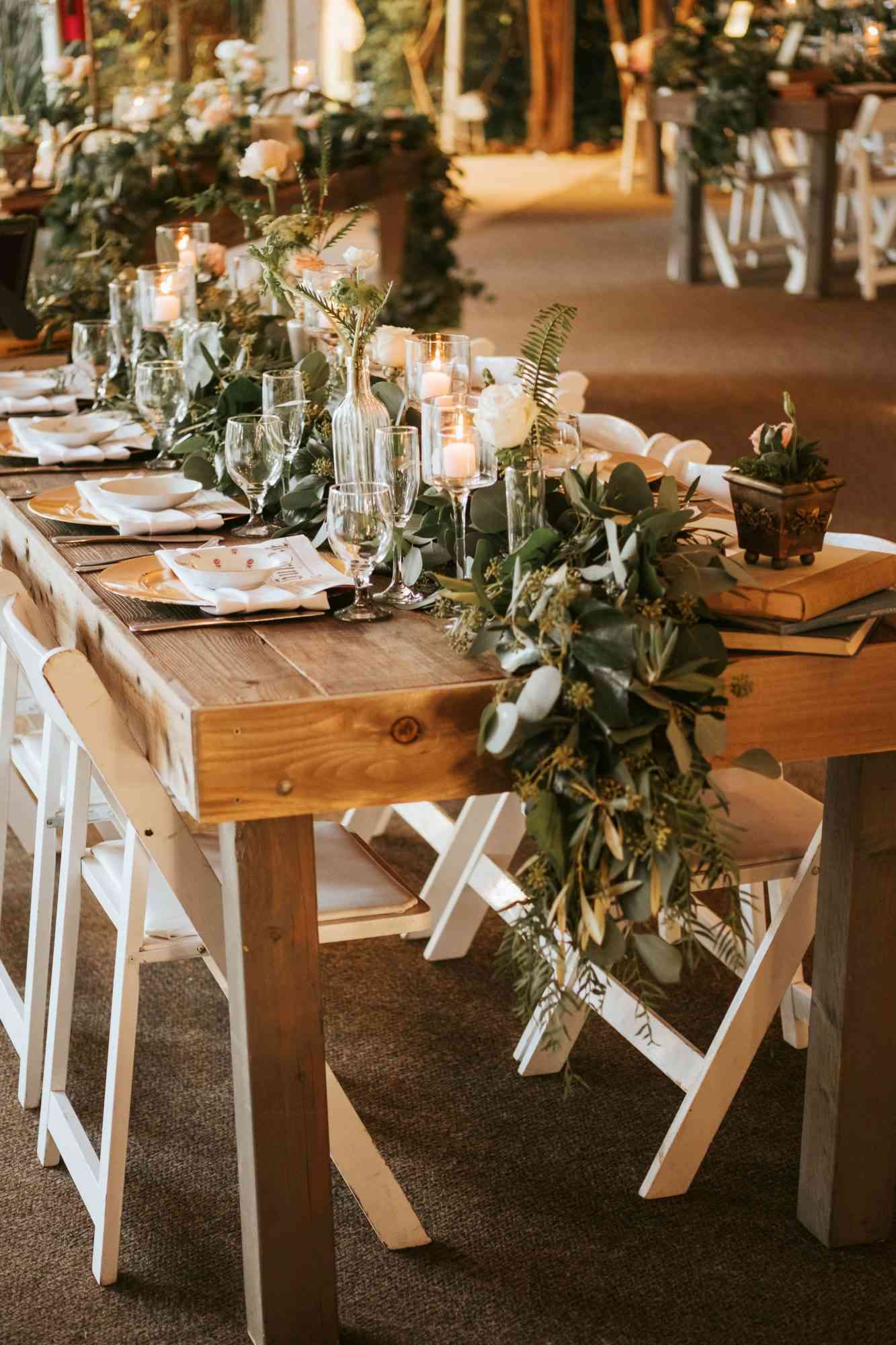 fall wedding centerpieces rustic wooden table greenery