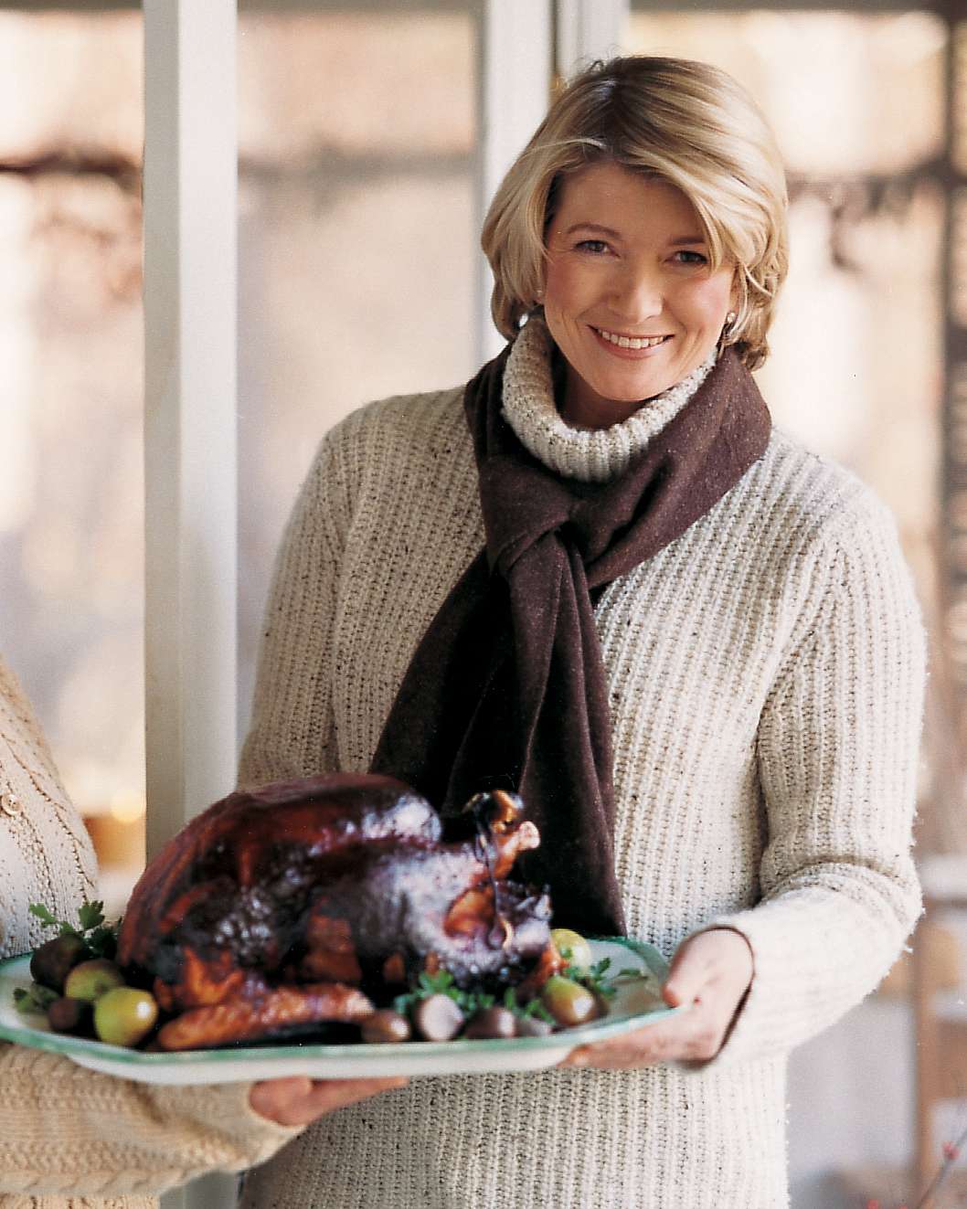 Martha Stewart holding Grilled Turkey Platter