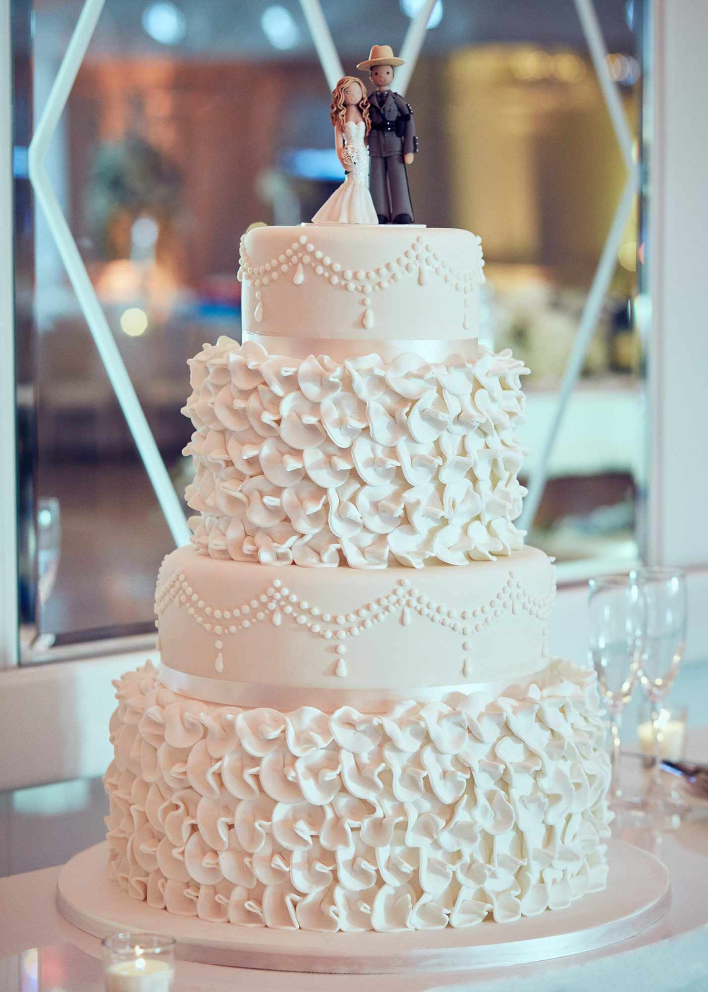 shqipe zenel wedding cake with couple topper