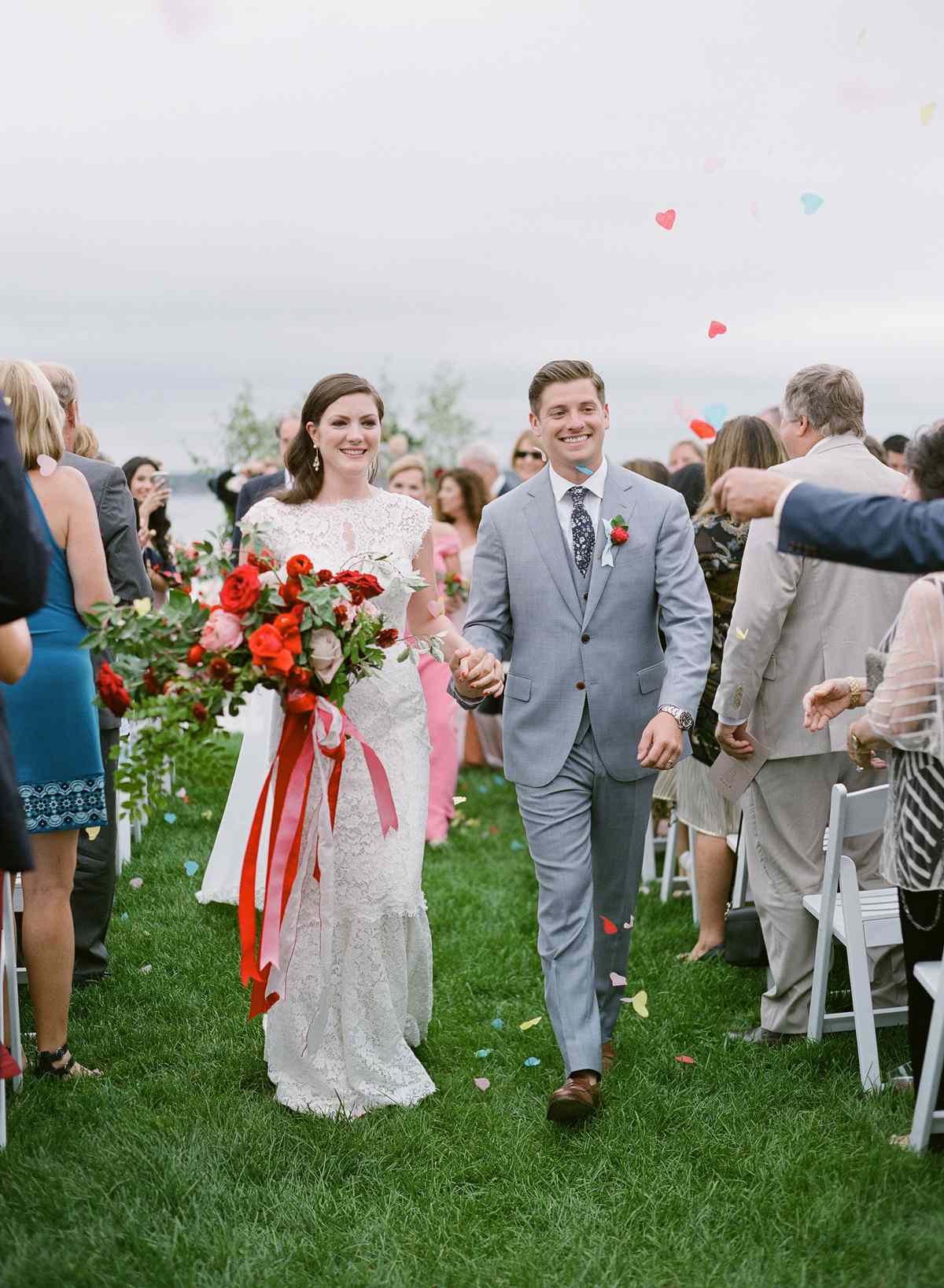 colleen stephen newport wedding recessional with colorful confetti