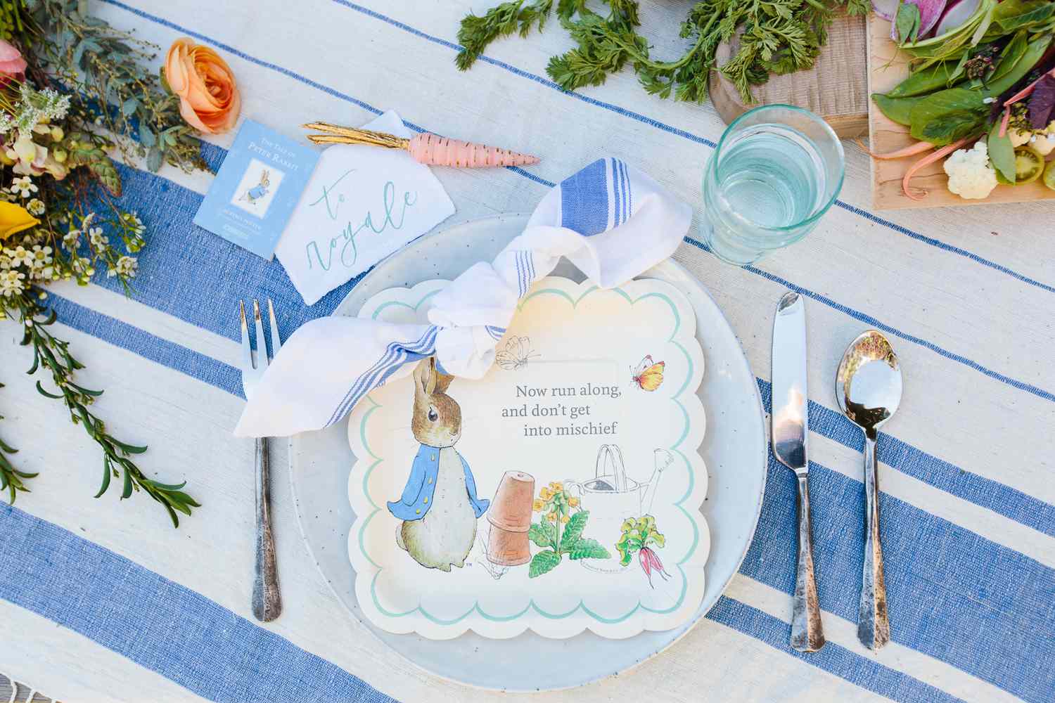 A place card at a Peter Rabbit-themed baby shower.