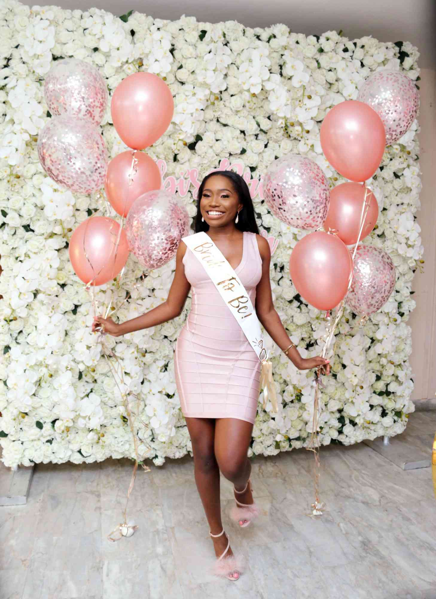 flower girl all white photo backdrop bride to be pink balloons