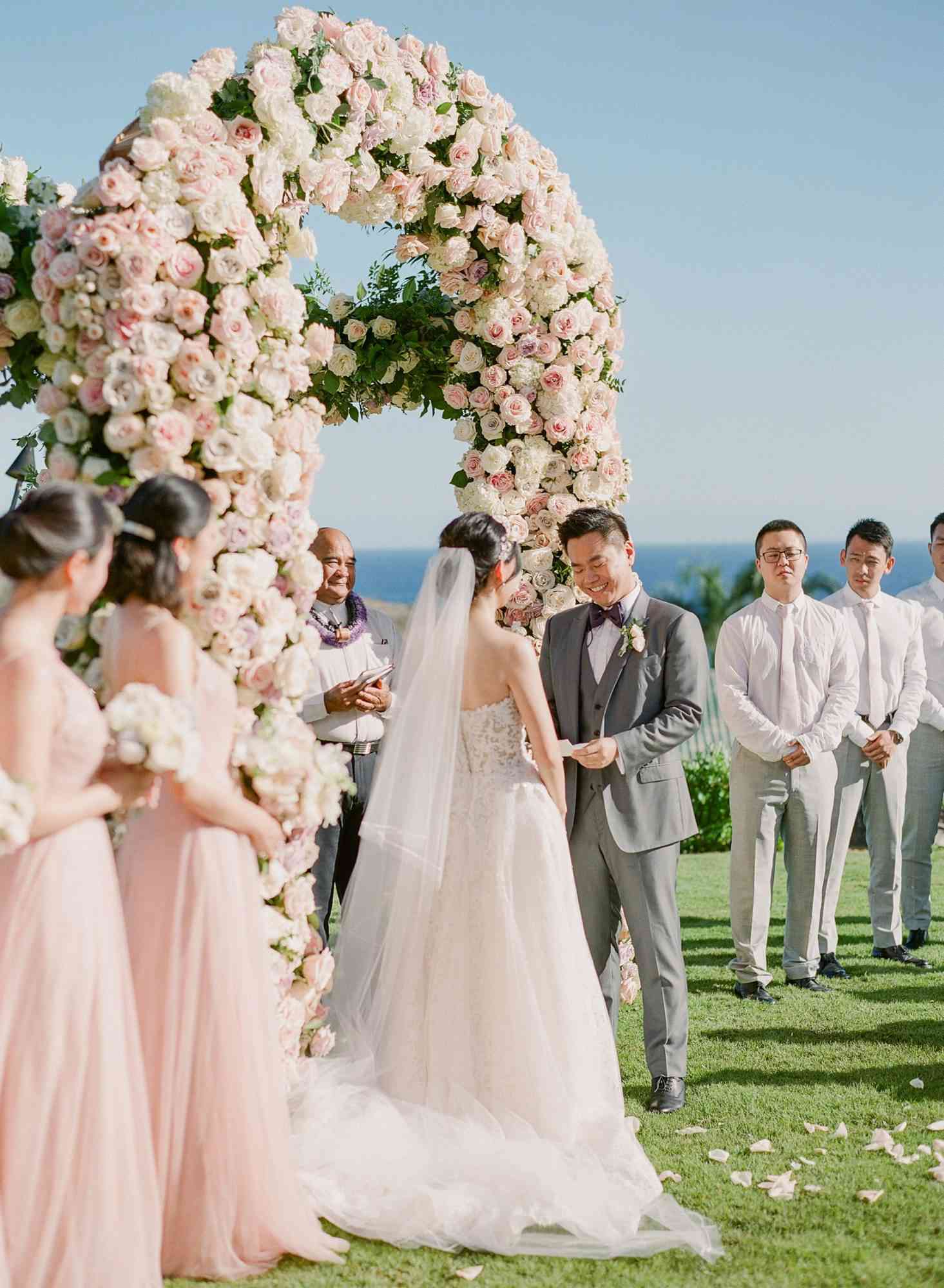 outdoor hawaiian wedding ceremony vow reading