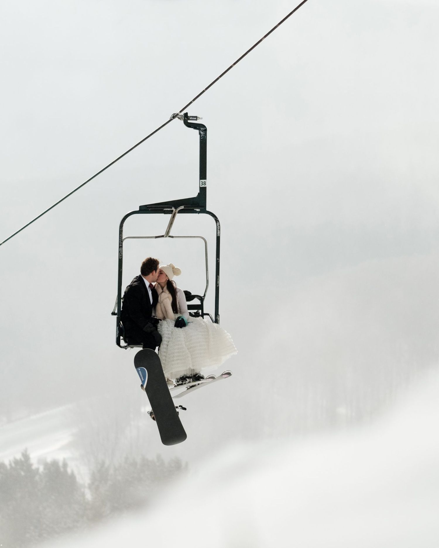 lauren and christian kissing on ski lift