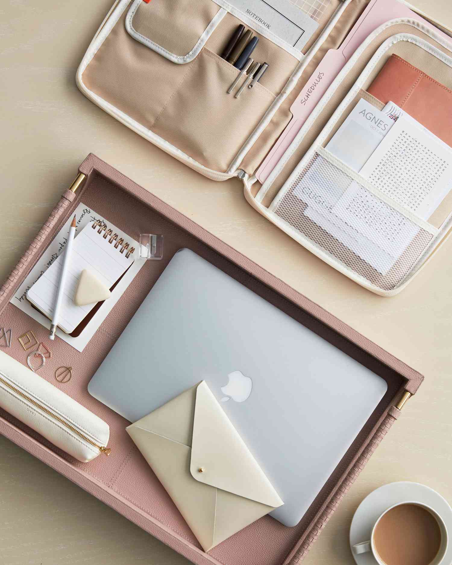 pink tray with office equipment and supplies