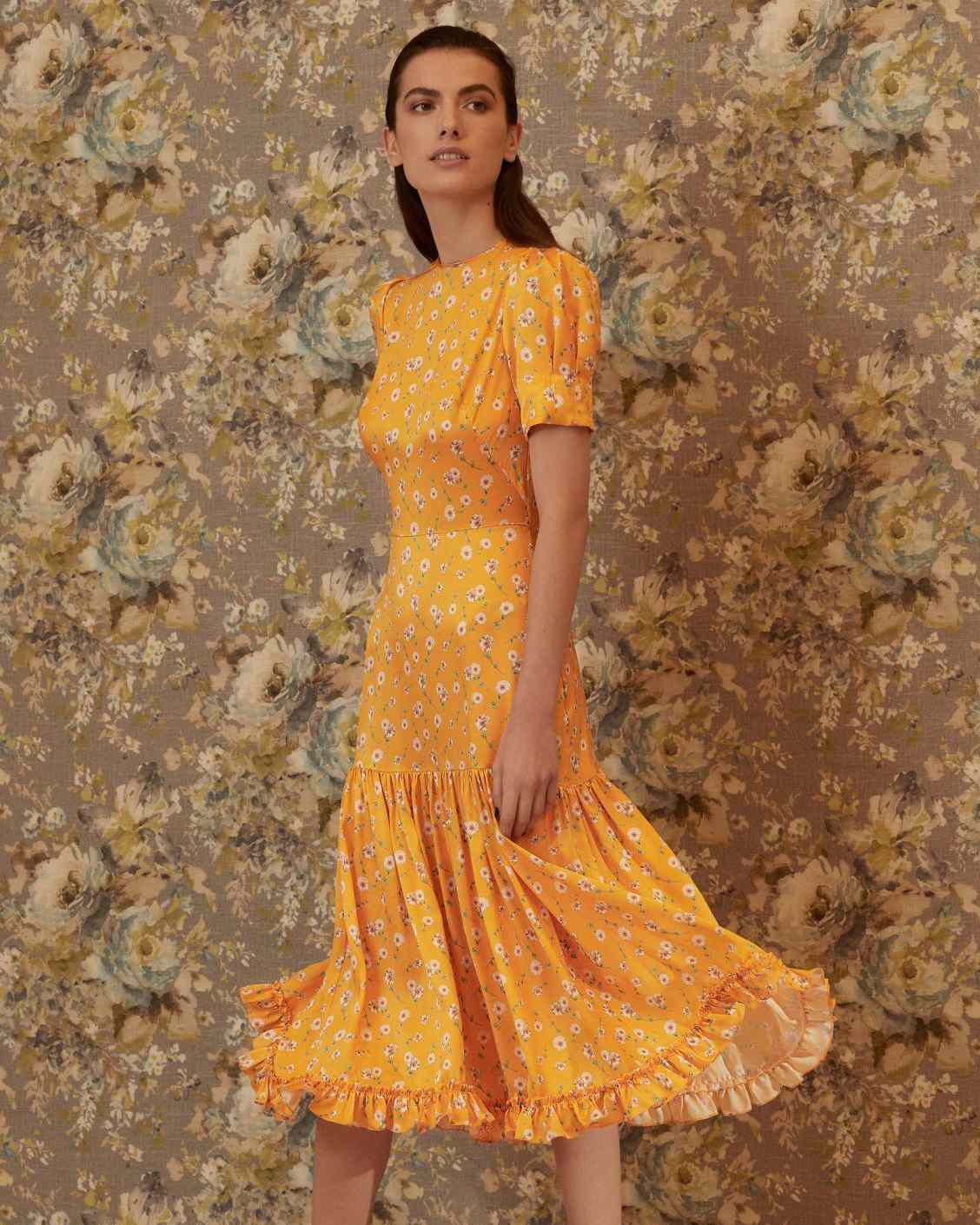 yellow silk midi dress with puff sleeves and daisy floral print