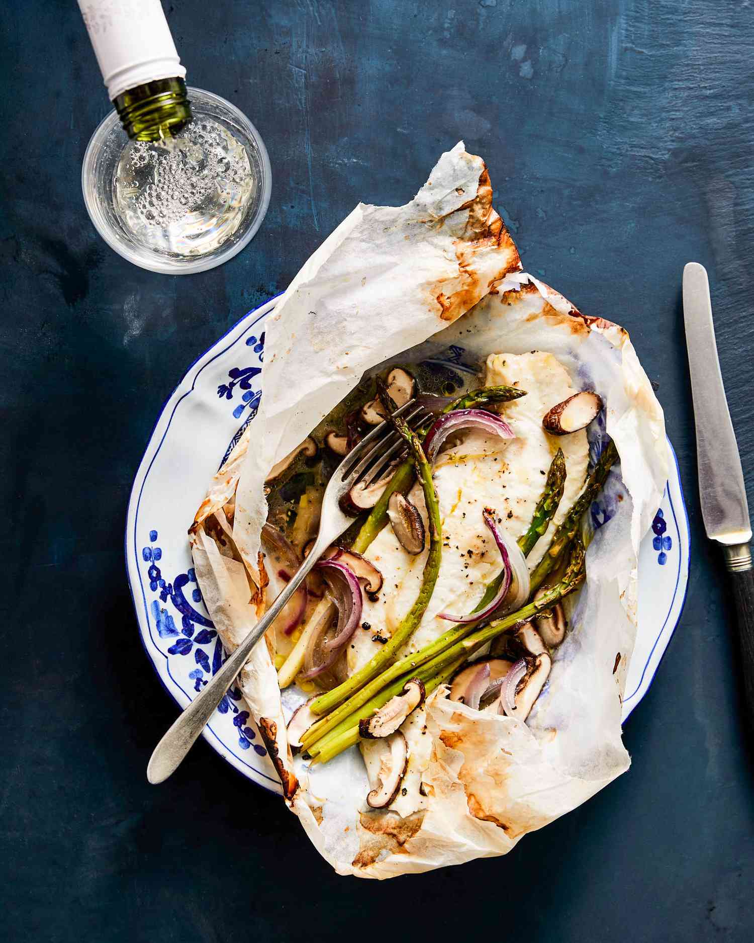 Flounder en Papillote with Asparagus and Shiitake Mushrooms on decorative plate