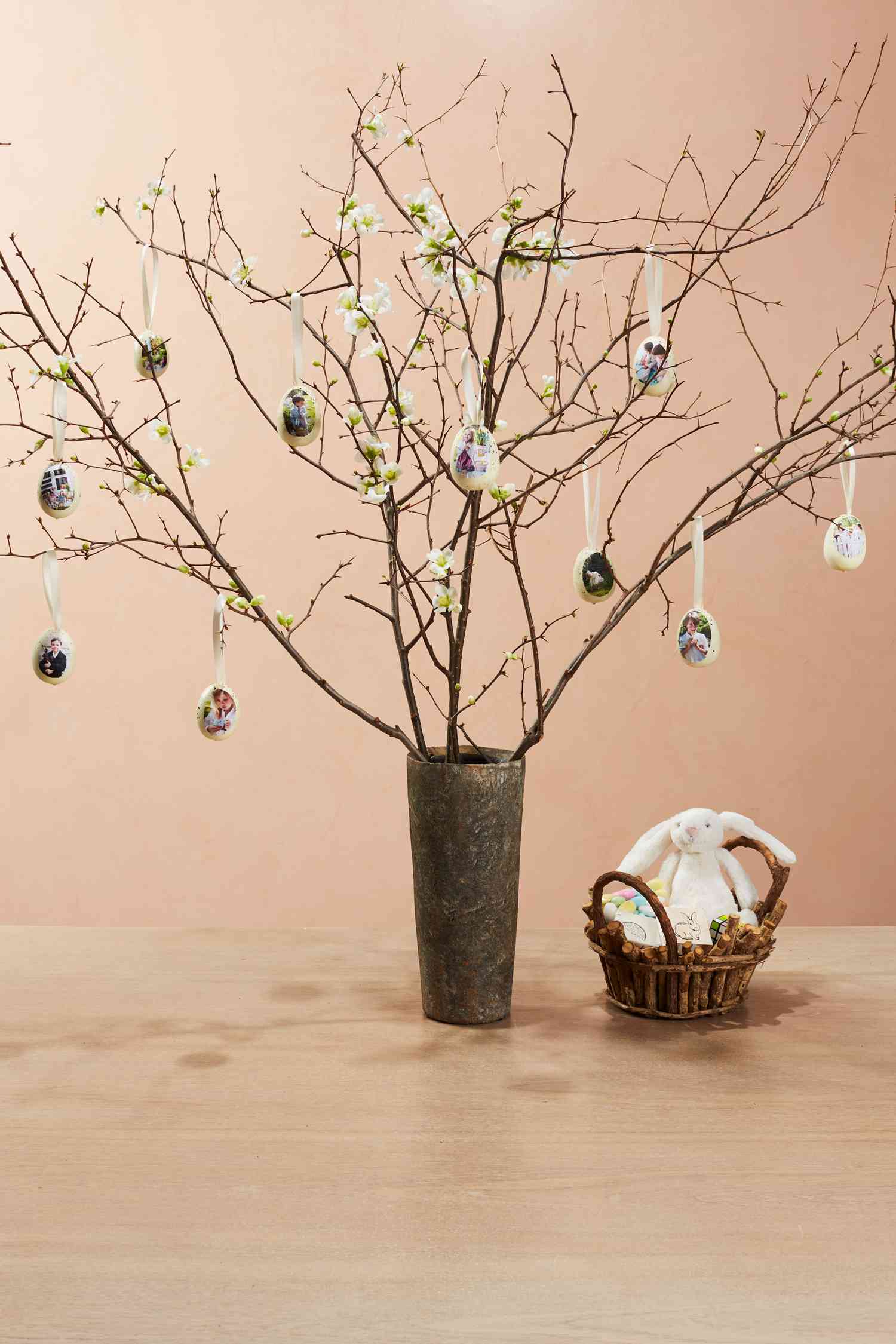 family easter egg ornaments hanging from floral branches