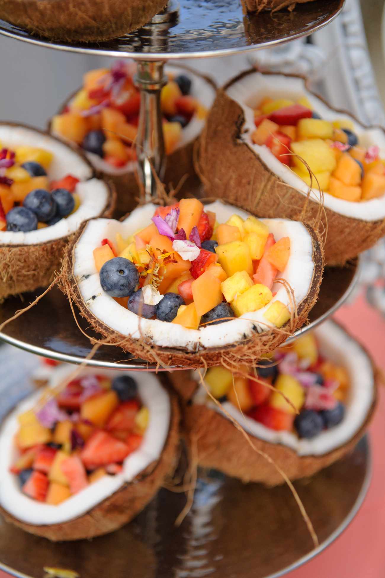 coconut bowls filled with mixed fruit