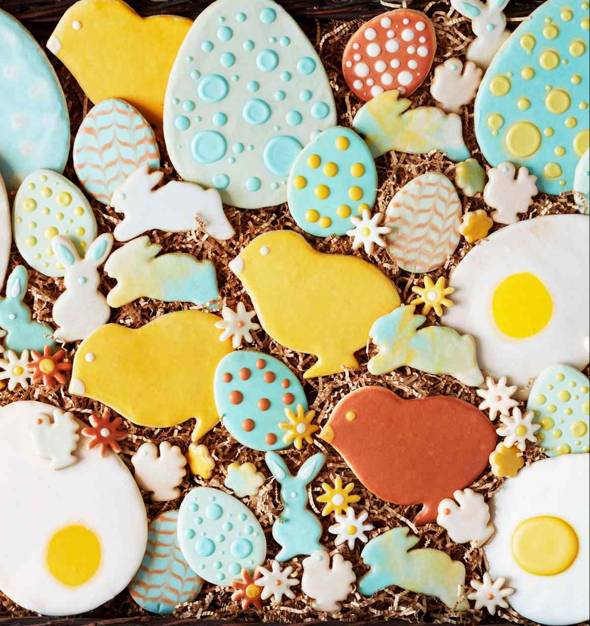 colorful frosted spring themed and easter egg sugar cookies