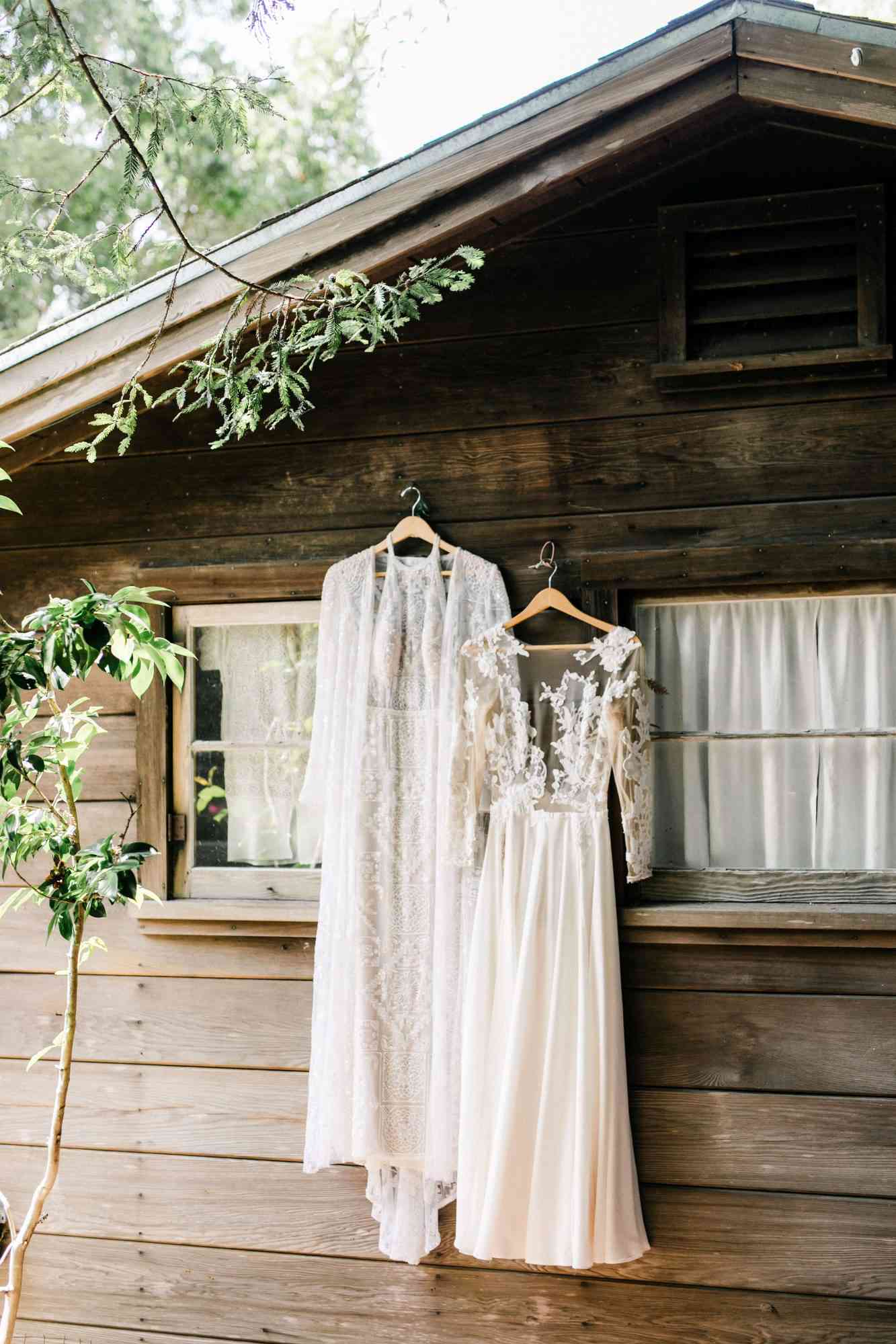 amanda chase wedding dresses hung up on cabin wall