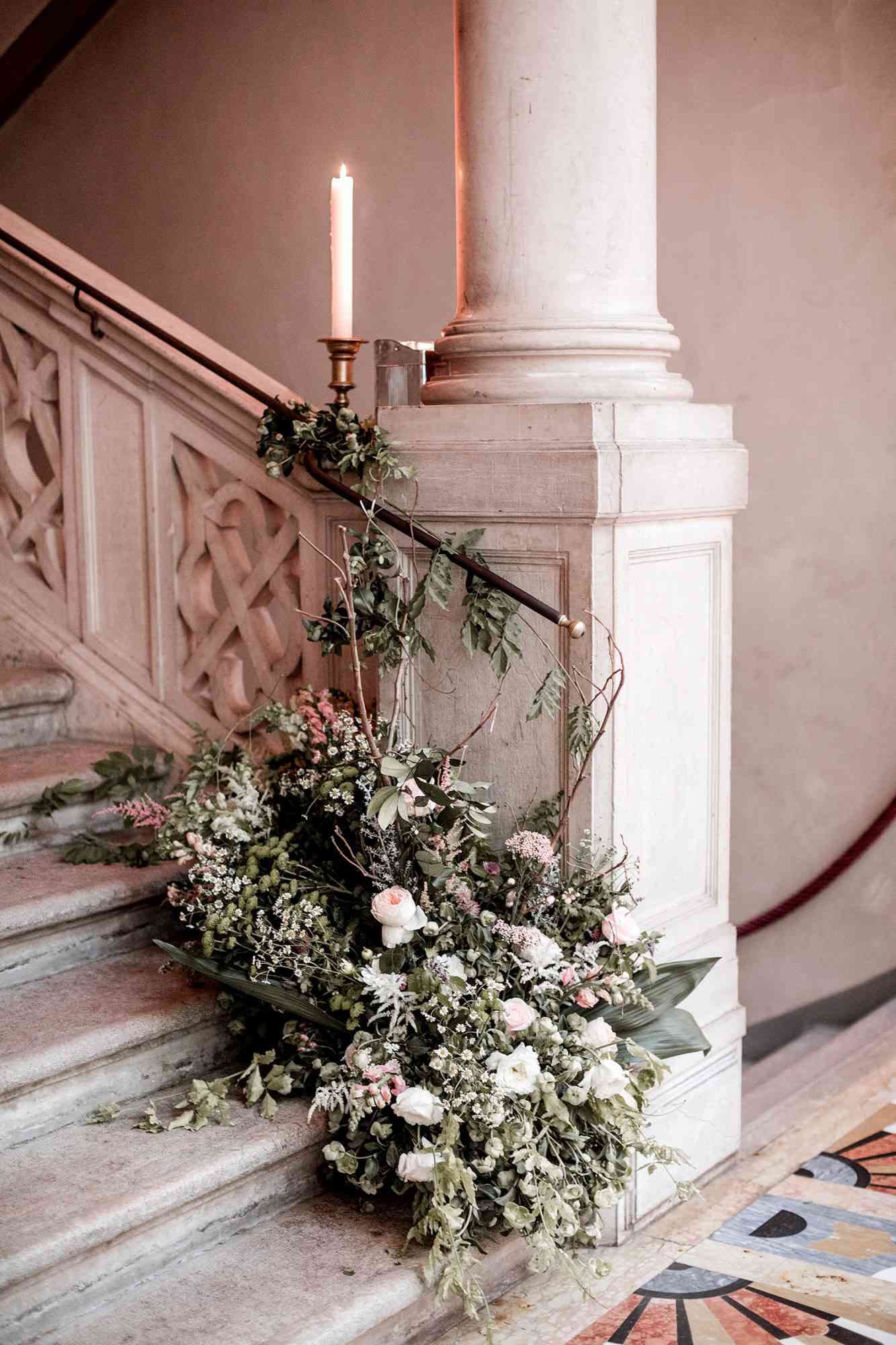 elle raymond venice wedding stairway floral decor