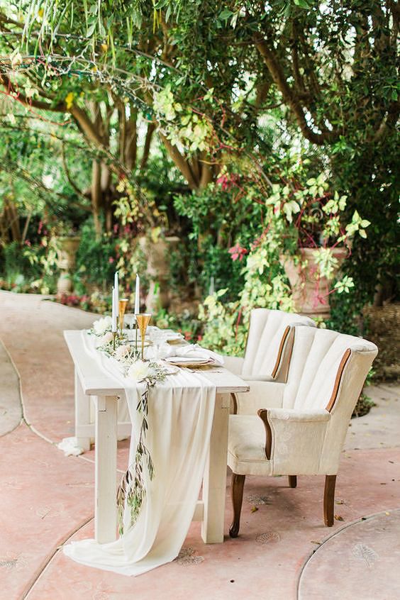 sweetheart table outdoor monochromatic white comfy chairs