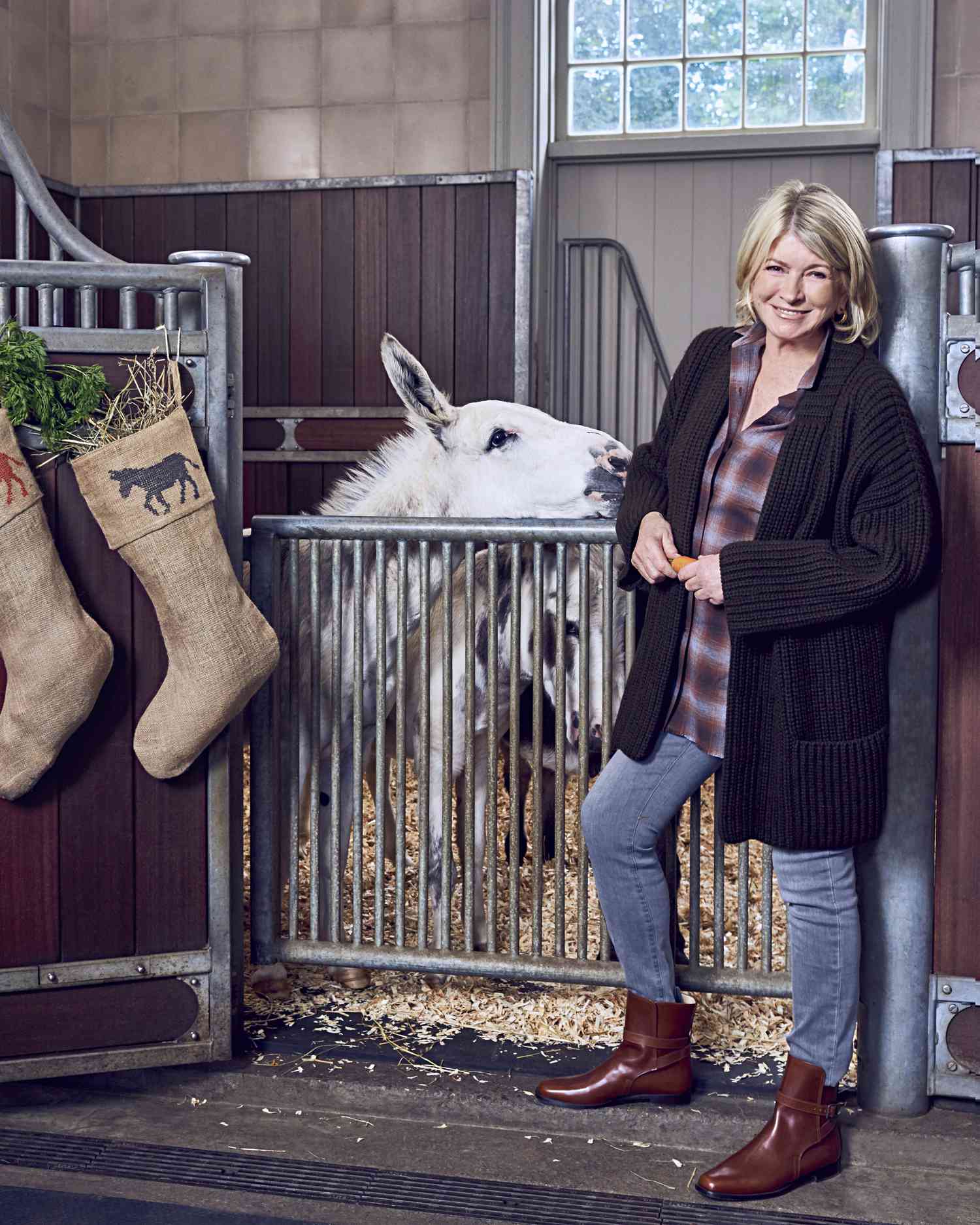 martha in stables with donkey