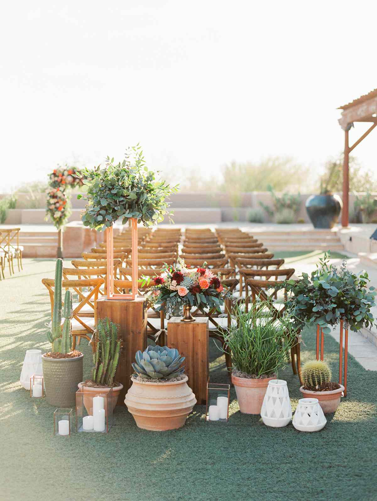 last row ceremony chair decorations terra cotta pots and cacti
