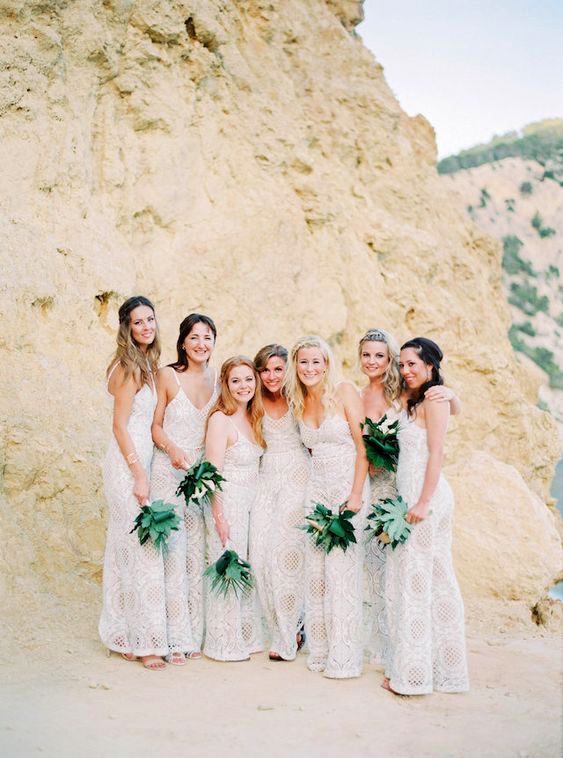 women in desert wearing bridesmaids jumpsuits