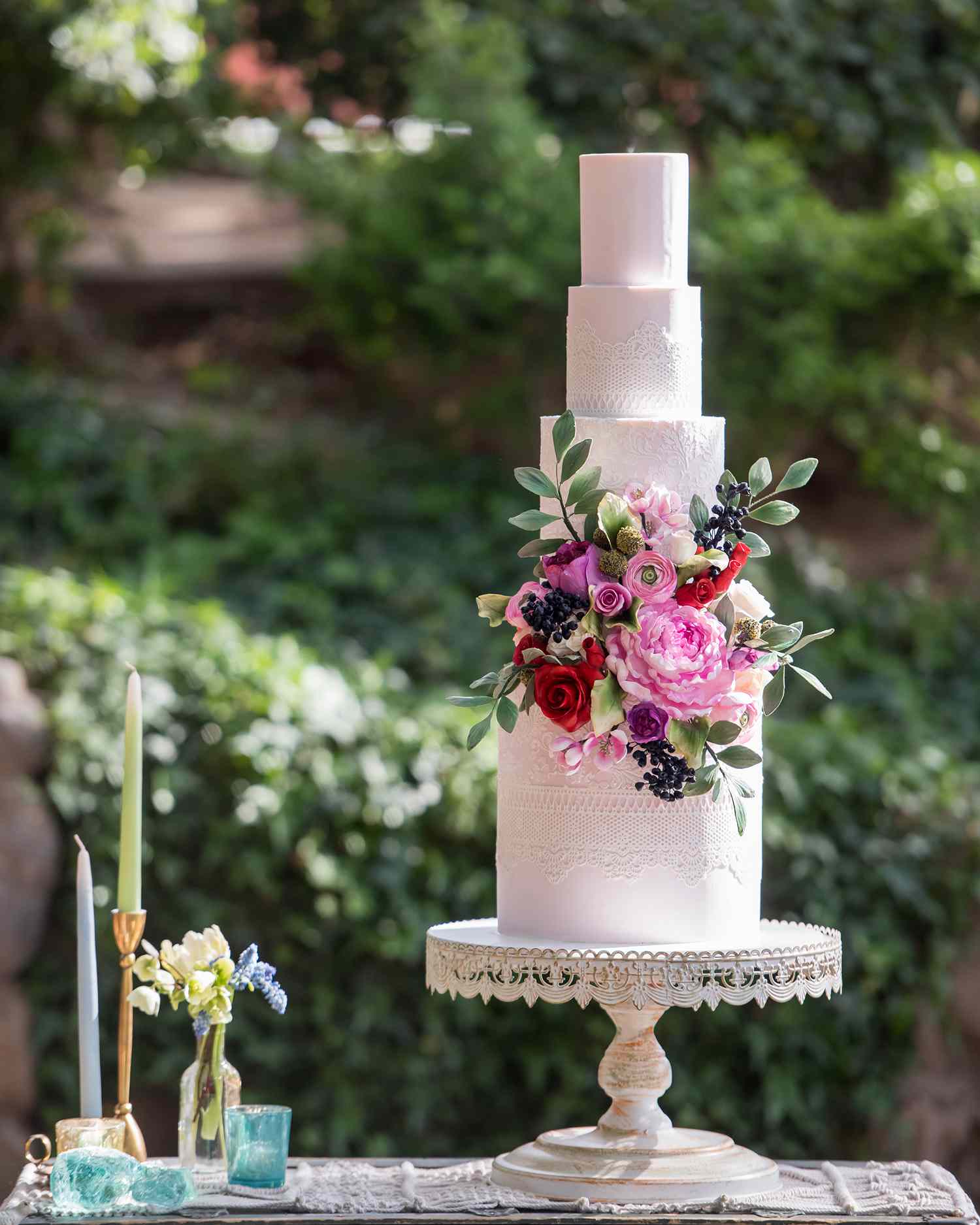 lace and bright florals wedding cake accents