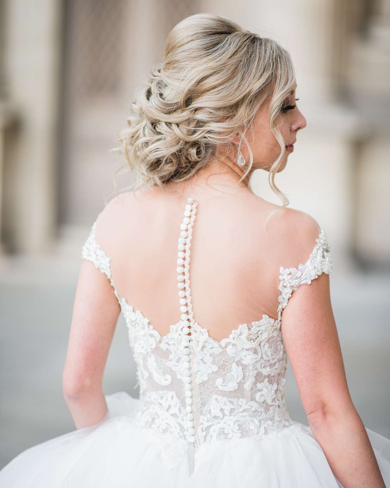wedding dresses with buttons illusion back