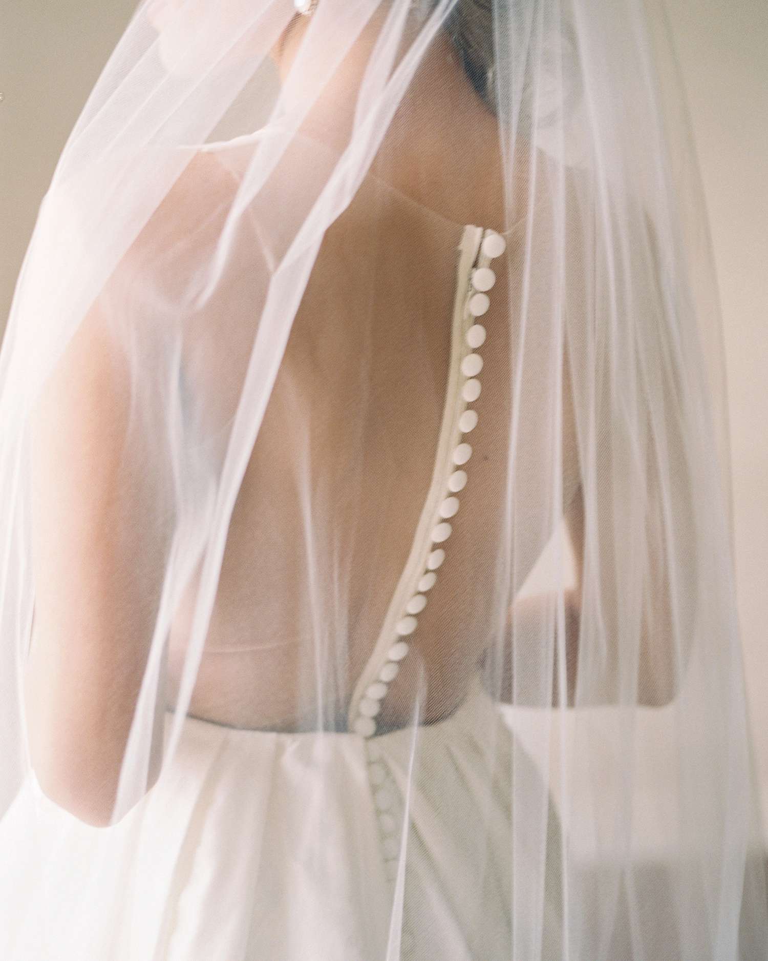 wedding dresses with buttons sheer veil