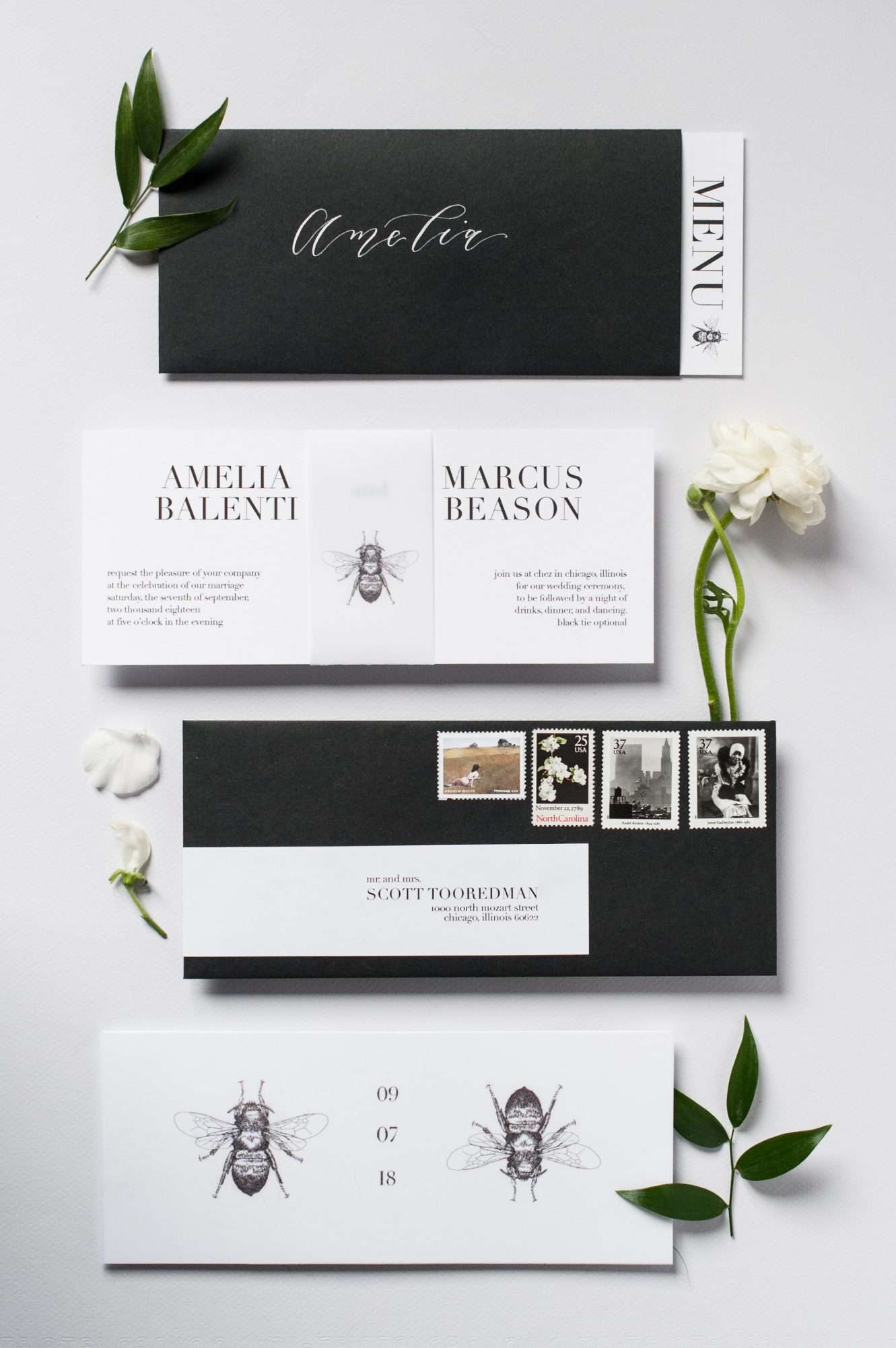 black and white wedding invitation with envelope