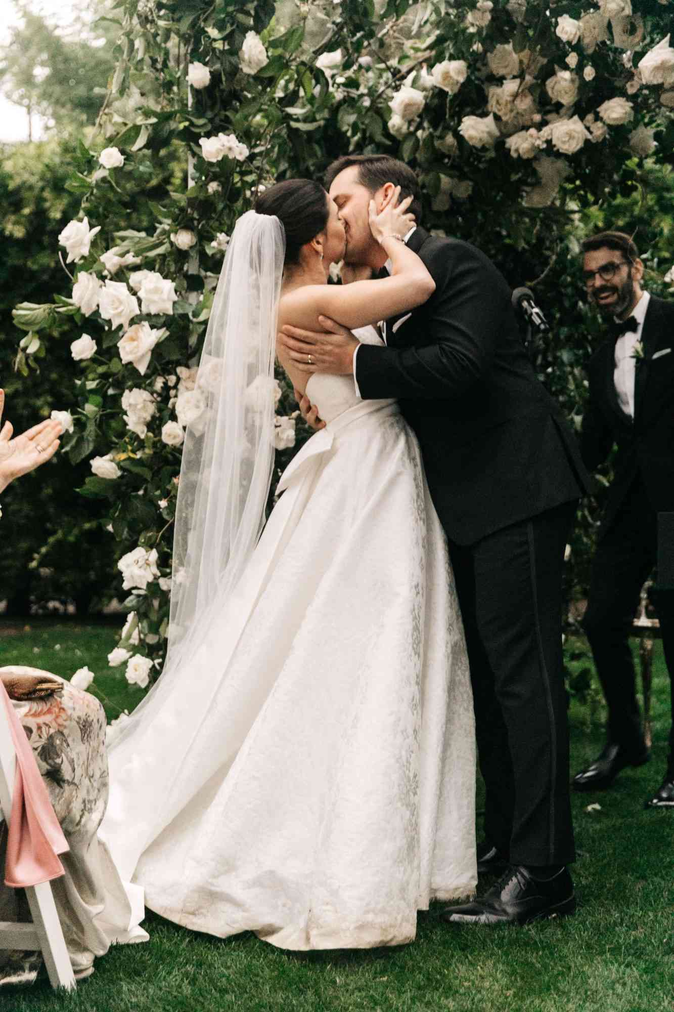 mia patrick wedding ceremony bride and groom kiss