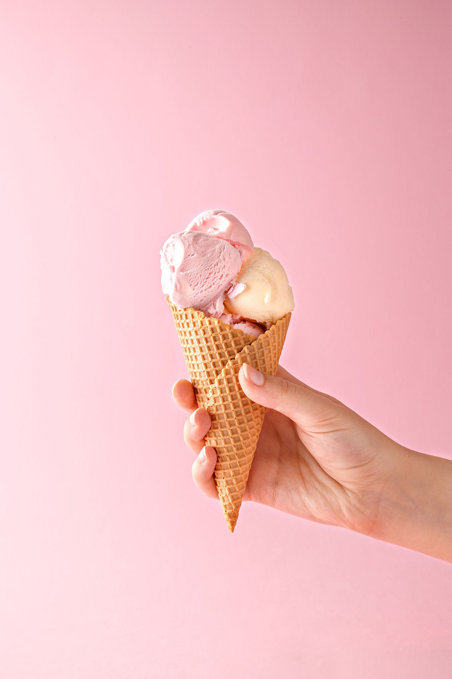 Vanilla and Strawberry Ice Cream in a Cone