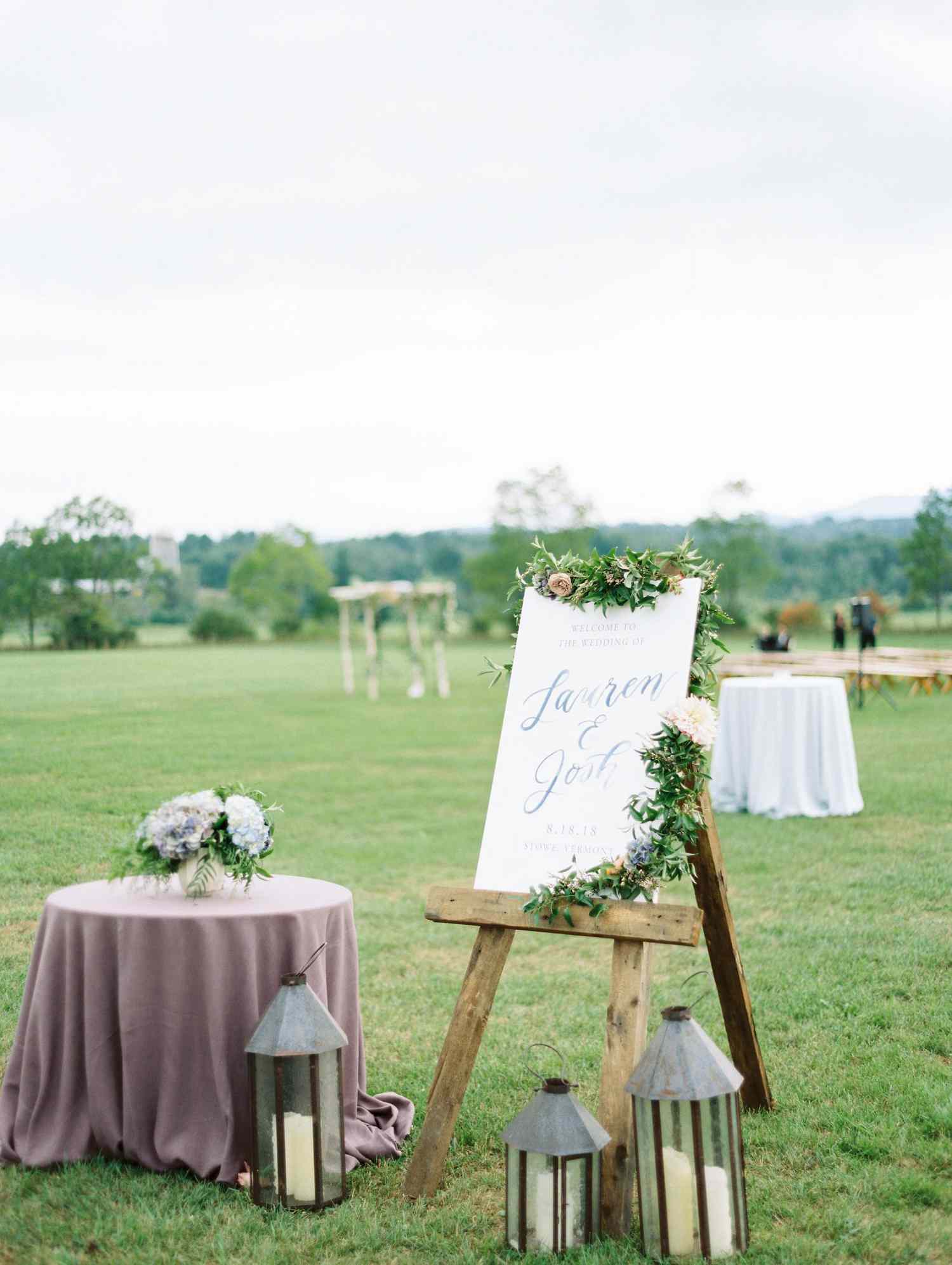 lauren josh wedding sign in field