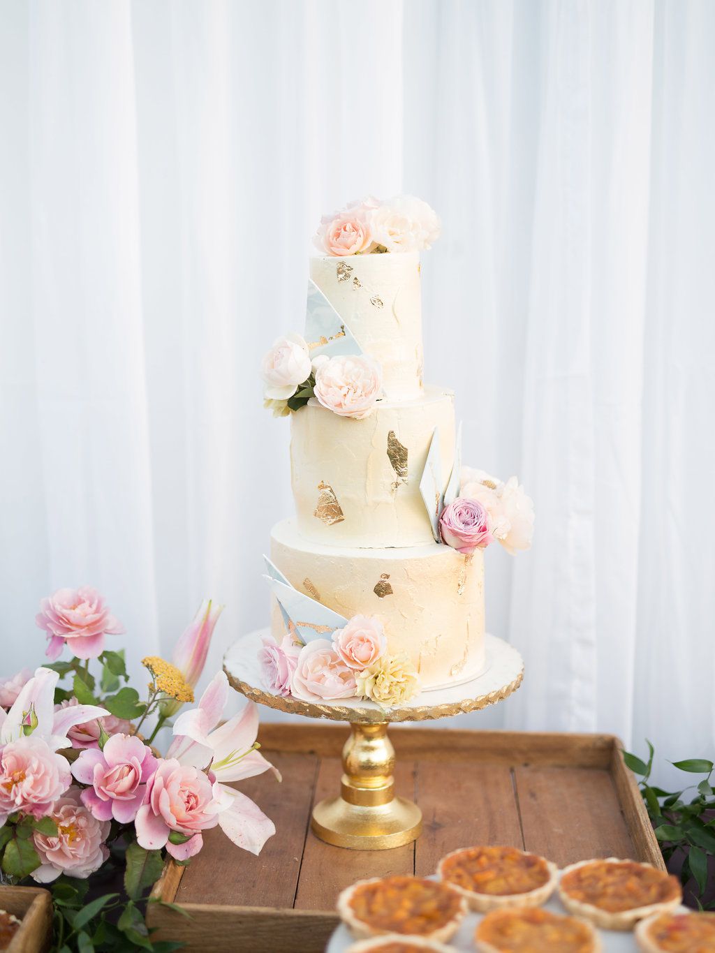 paige zack wedding cake on pedestal