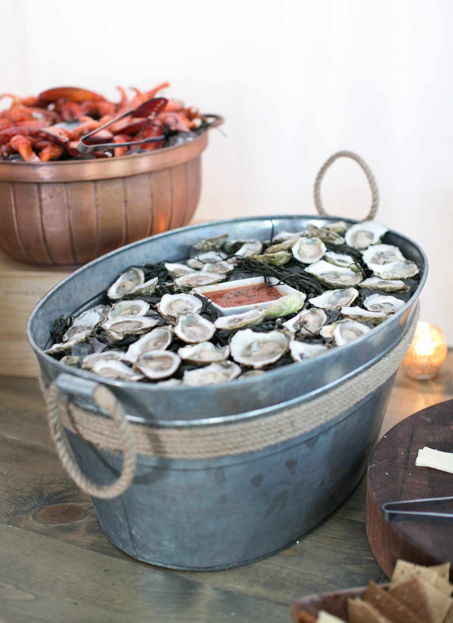 seafood filled metal barrel with rope decor