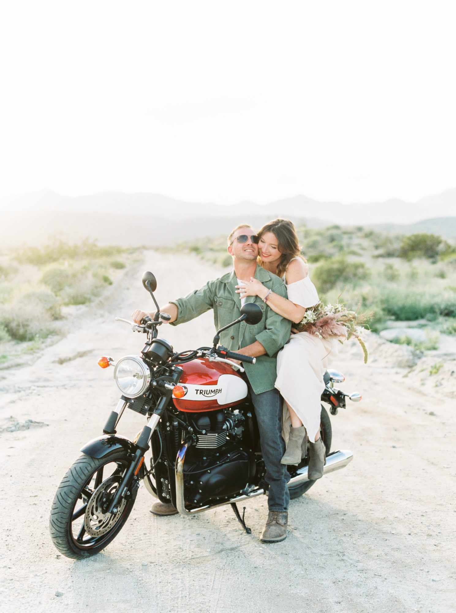 couple on motorcycle engagement photo