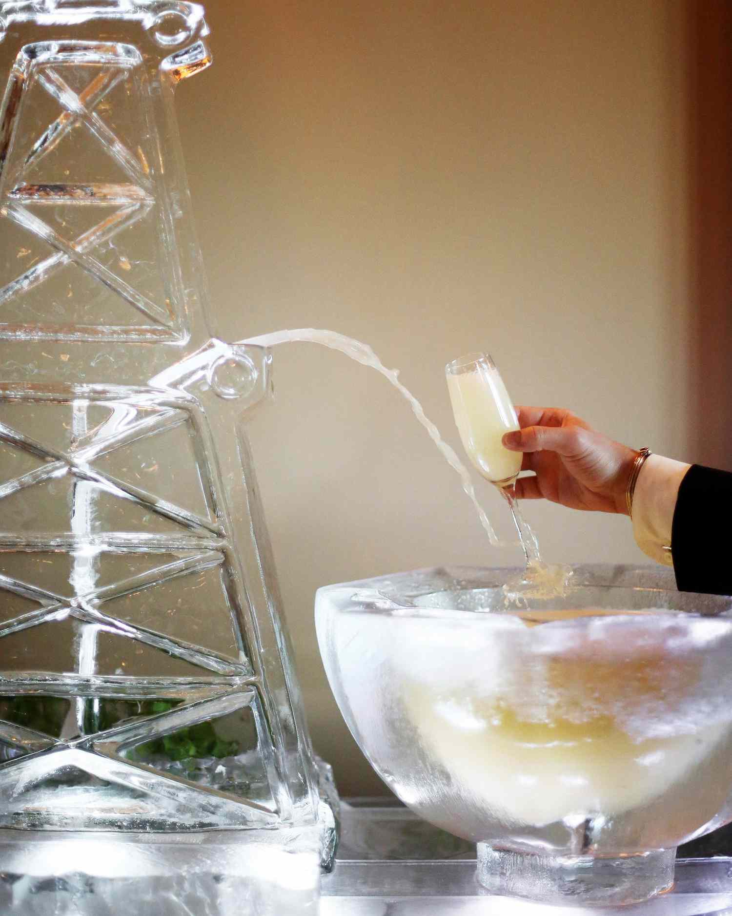 wedding ice sculpture groom cake alternative drink serving station