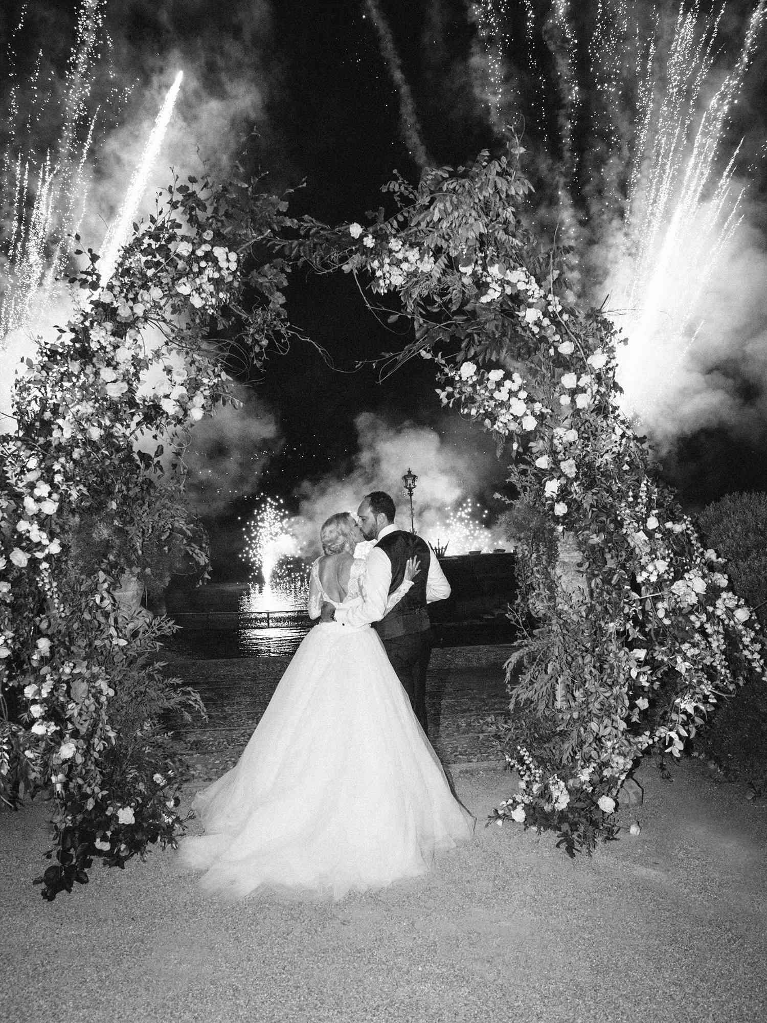julia mauro wedding couple under fireworks