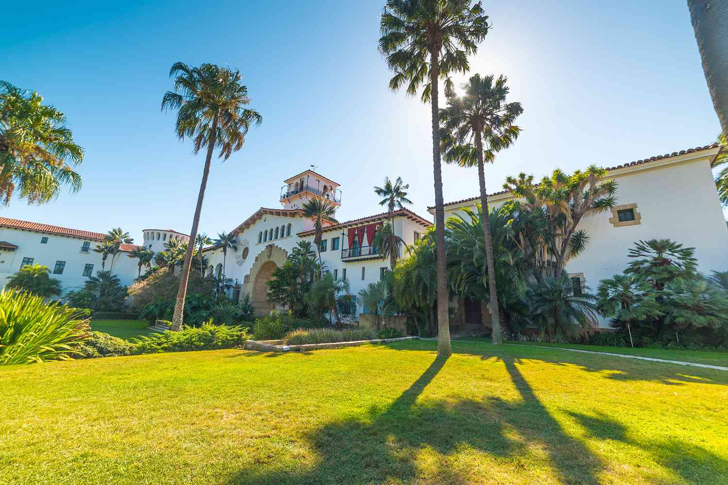 spanish colonial style home palm trees