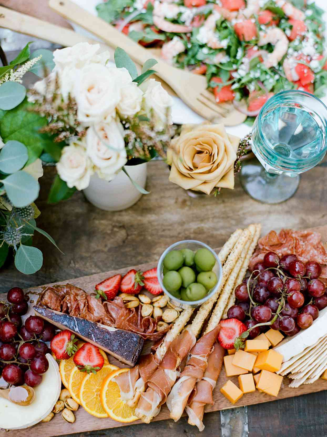 wedding grazing board with cheese, meat, and fruit