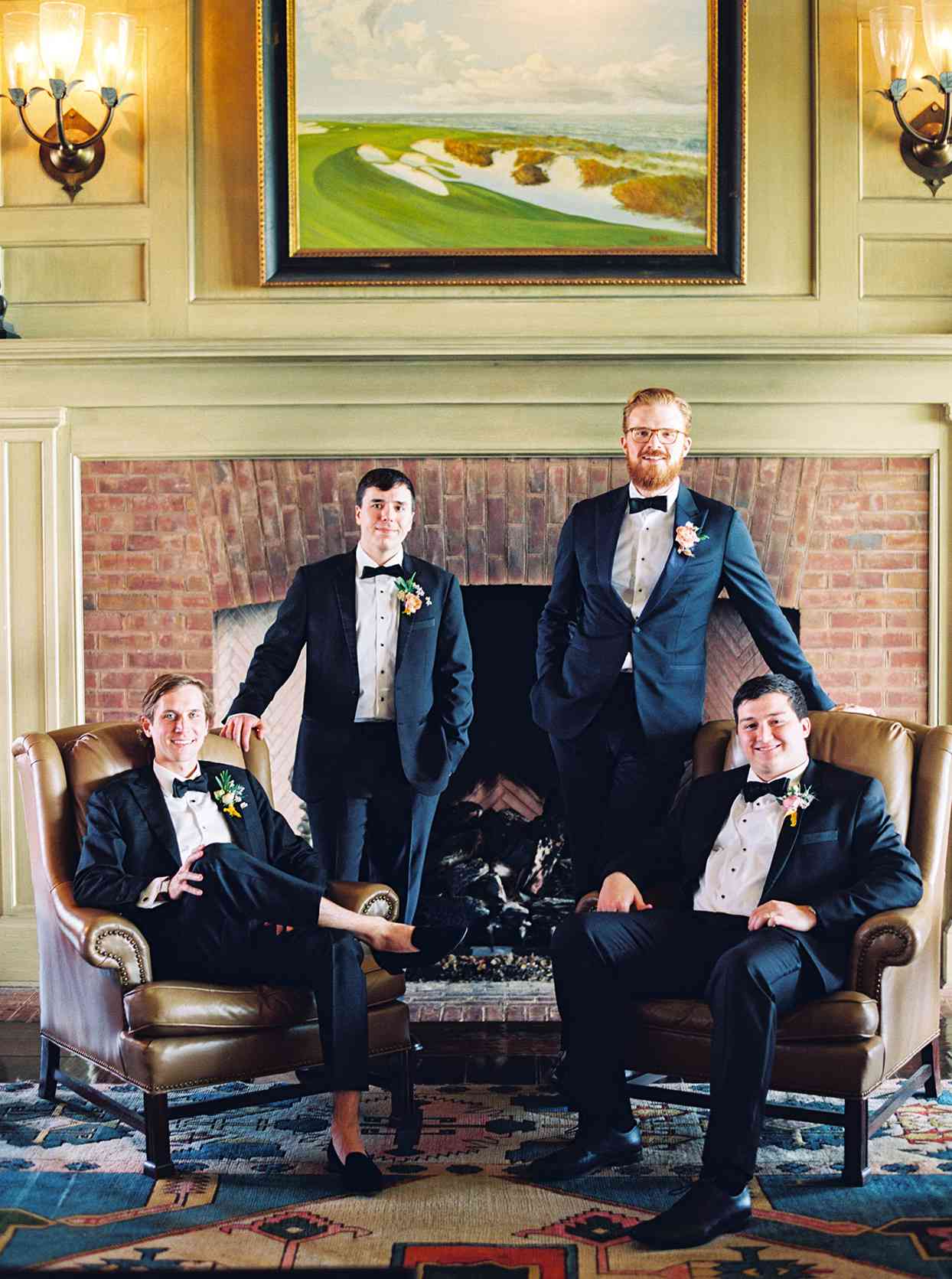 lauren dan wedding groomsmen in front of fireplace